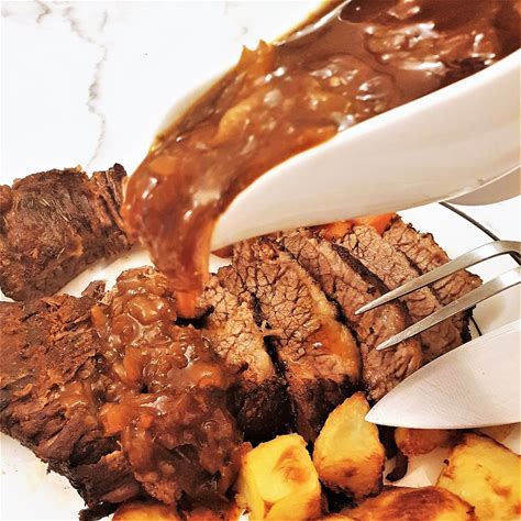 slow-roasted-brisket-with-onion-gravy-foodle-club image