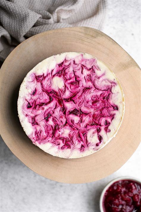 cranberry-sauce-swirl-cheesecake-ahead-of-thyme image