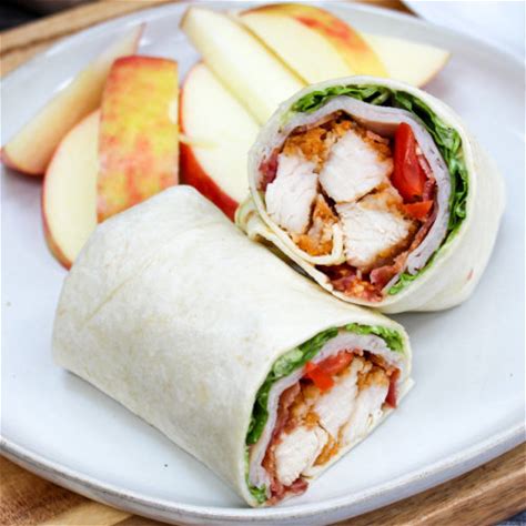 crispy-chicken-club-wrap-cheese-curd-in-paradise image