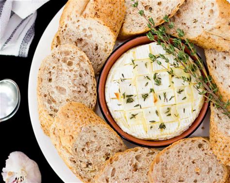 garlic-and-thyme-baked-camembert-recipe-sidechef image