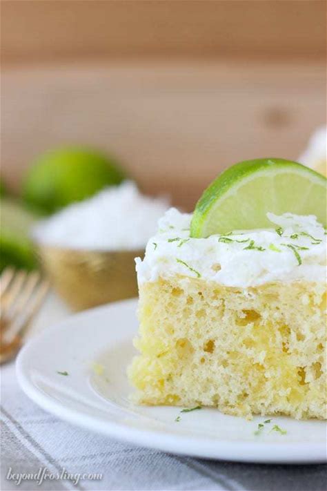 moist-coconut-lime-poke-cake-recipe-beyond-frosting image