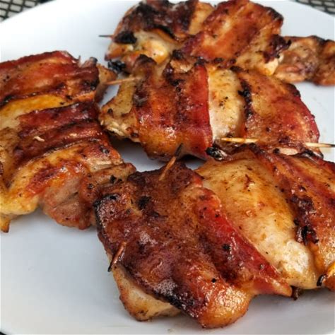 bbq-bacon-wrapped-chicken-thighs-amanda-cooks image