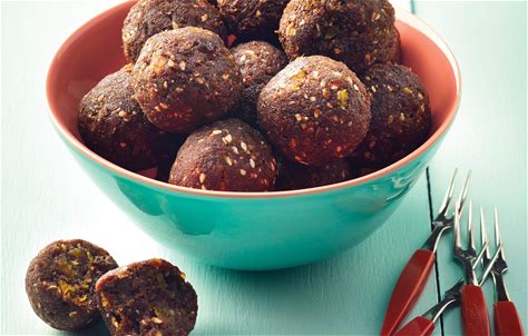 raisin-date-apricot-and-cocoa-bliss-balls-healthy image