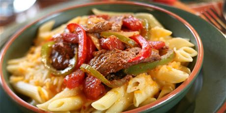 beef-fajita-stir-fry-on-pasta-food-network-canada image
