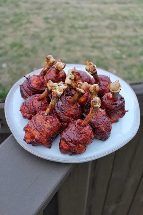 honey-bacon-bbq-chicken-lollipops-over-the-fire image