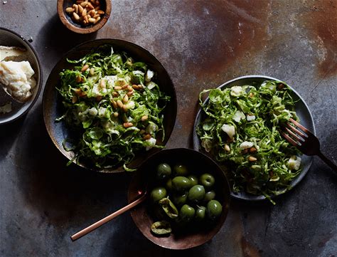 shaved-brussels-sprouts-pine-nuts-and-green-olives image