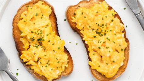 soft-and-fluffy-scrambled-eggs-recipe-tasting-table image