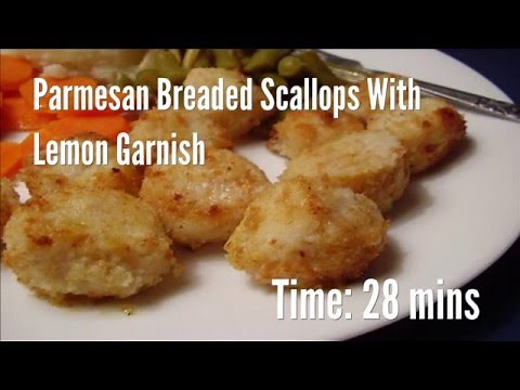 parmesan-breaded-scallops-with-lemon-garnish image
