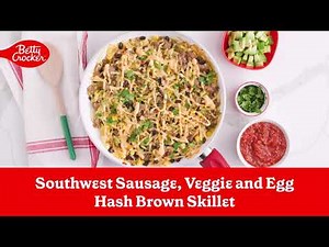 southwest-sausage-veggie-and-egg-hashbrown-skillet image