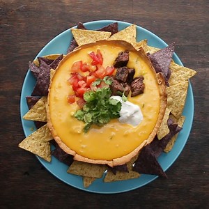 loaded-queso-in-a-tortilla-bowl-by-tasty-presents image