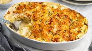 potatoes-au-gratin-with-gruyere-recipe-tasting-table image