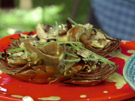learn-how-to-make-bobby-flays-grilled-artichokes image
