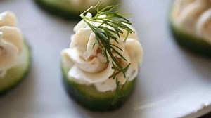 salmon-mousse-on-cucumber-coins-entertaining-with-beth image