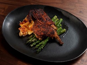 cornish-game-hen-under-a-brick-recipe-food-network image