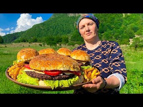 a-couple-cooks-huge-papa-burger-and-little-kids image