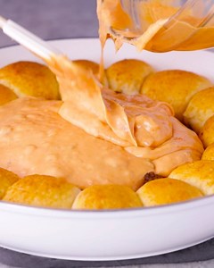 skillet-queso-dip-with-taco-biscuit-bombs-facebook image