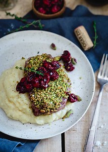 pistachio-crusted-lamb-chops-with-red-wine-cherry image
