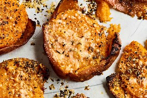 cheesy-garlic-and-herb-smashed-sweet-potatoes-kitchn image