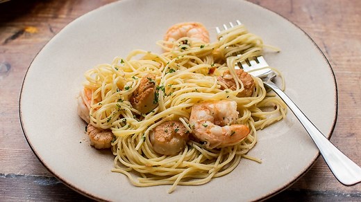 shrimp-and-scallop-scampi-recipe-tasting-table image