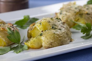 parmesan-smashed-potatoes-mrfoodcom image