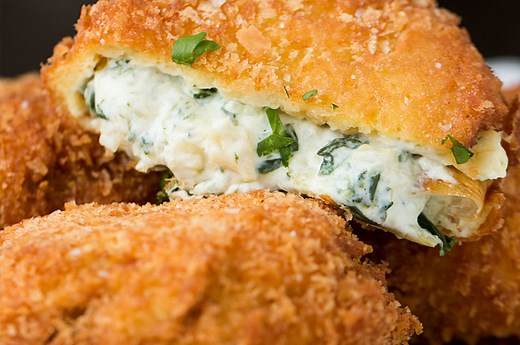 these-spinach-artichoke-dip-onion-rings-are-incredibly-tasty image