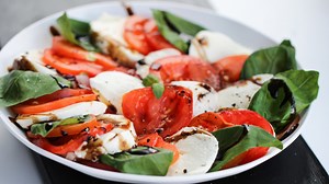 fresh-tomato-and-mozzarella-salad-recipe-tasting-table image